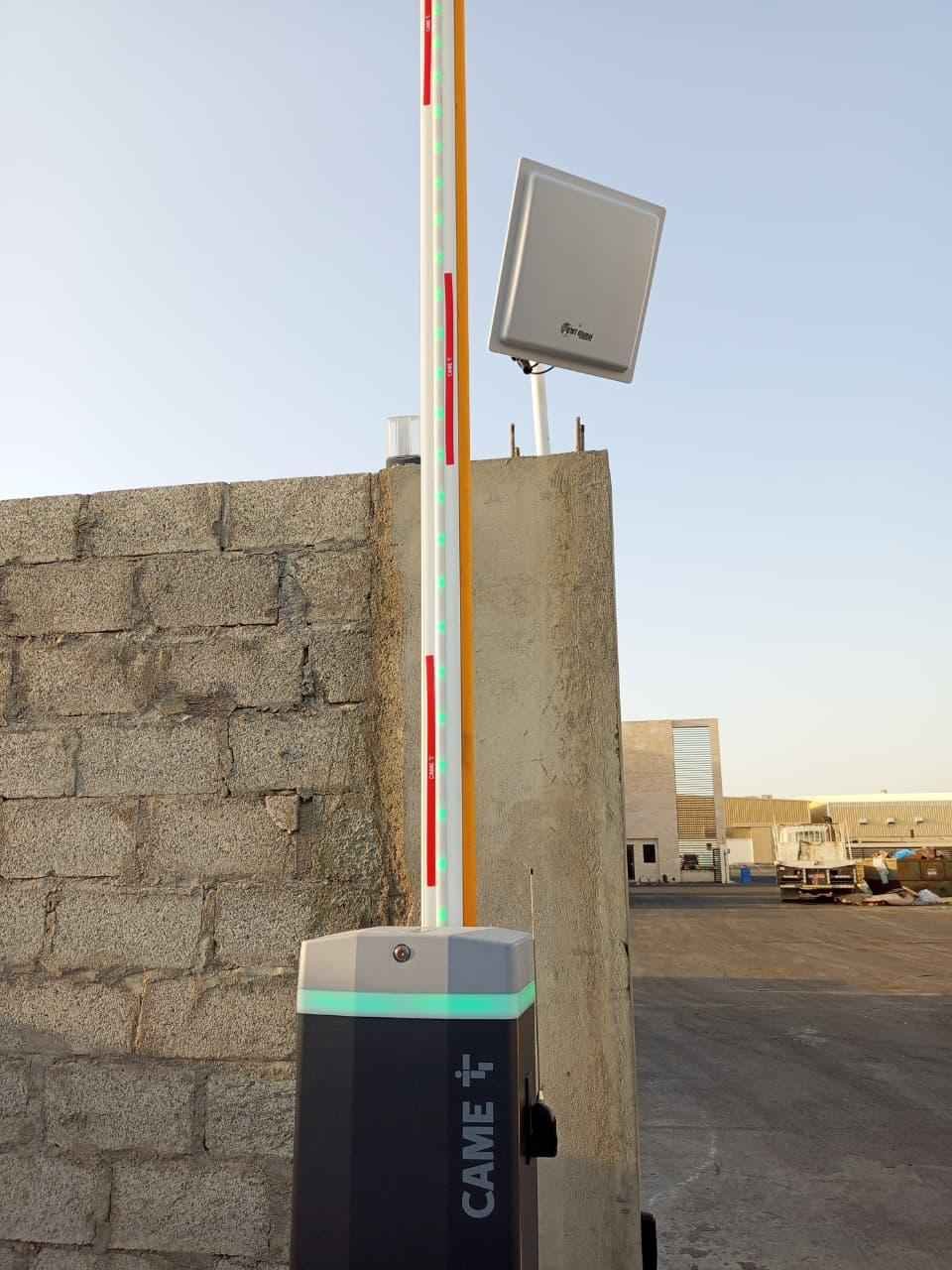 CAME LED boom barrier with a long range RFID reader controlling vehicle access at an industrial site in Oman
