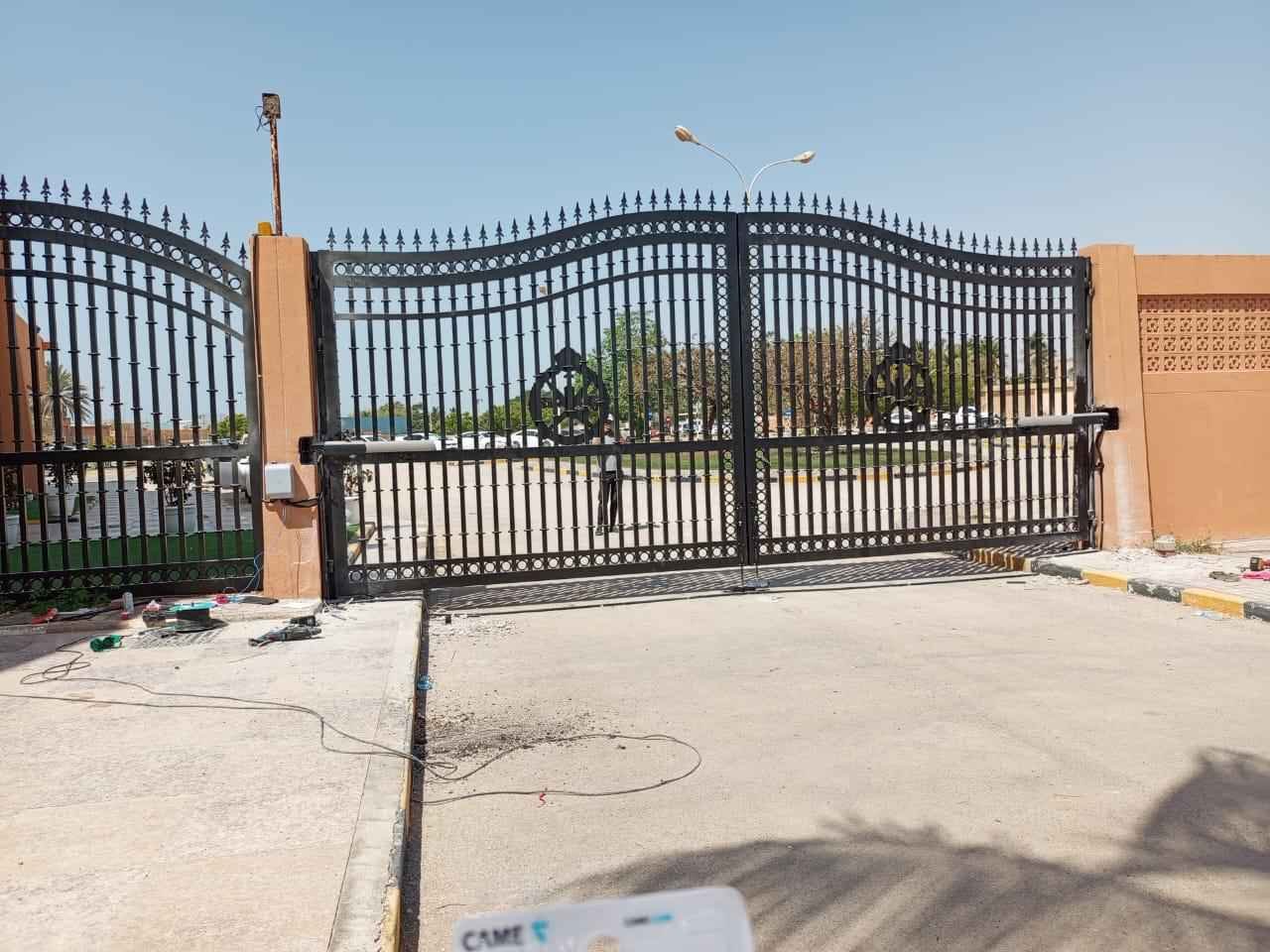 Linear swing gate operators fitted to a large ornamental double gate at a coastal property in Oman